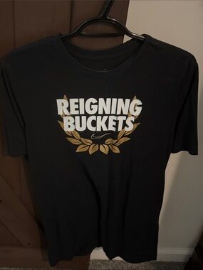 Nike Black Reigning Buckets Short Sleeve Tee with Gold Graphic